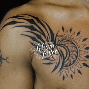 翼と太陽のタトゥー