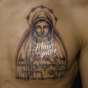 マリア様と文字のタトゥー