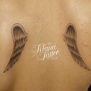 翼のタトゥー