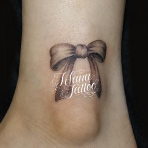 リボンのタトゥー