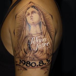 マリア様と日付のタトゥー