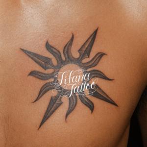 立体的な太陽のタトゥー