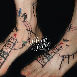 電線と鳥のタトゥー