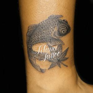 出目金のタトゥー