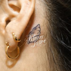 巻き貝のワンポイントタトゥー