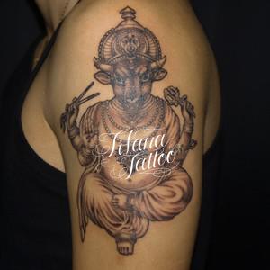 牛の神様のタトゥー