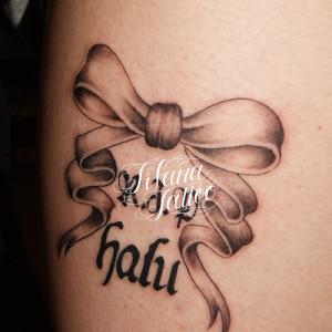 リボンのガールズタトゥー