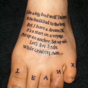 英語の文章のタトゥー