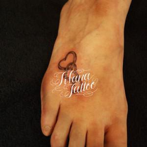 ハートの３連リングタトゥー