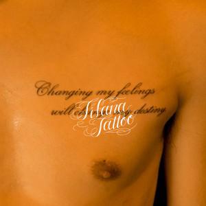 筆記体の書体のタトゥー