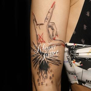 コルナのタトゥー