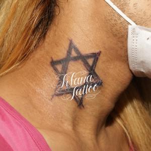 手書き風な六芒星のタトゥー