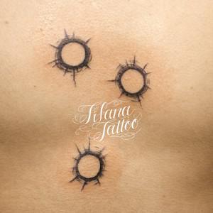 Bullet Hole Tattoo