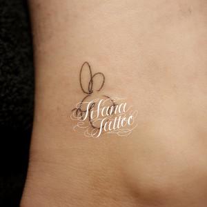 ネズミのワンポイントタトゥー