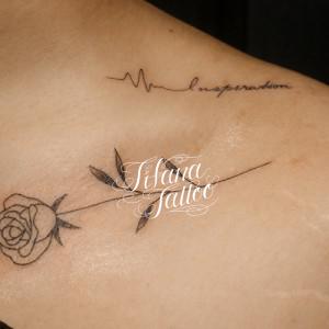 鎖骨部位のワンポイントタトゥー