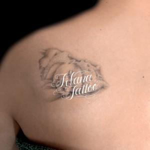 赤ちゃんのポートレートタトゥー