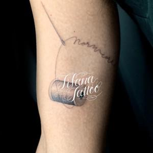 裁縫のタトゥー