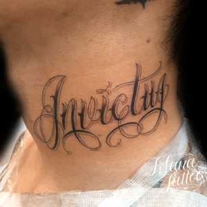 ラテン語のレタリングタトゥー