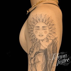 太陽と女神のタトゥー